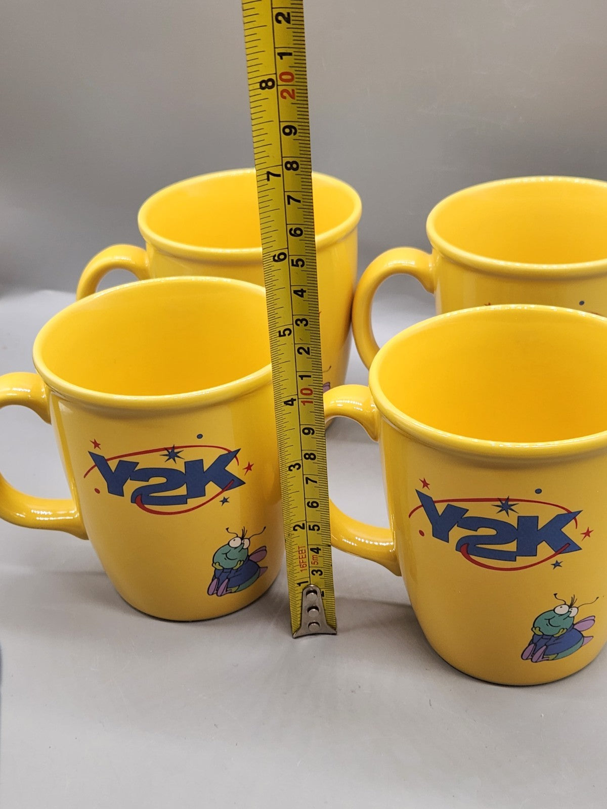 Vintage Y2K Promotional Coffee Mug Set of 4 Yellow Cartoon Fly Gonna Getcha Cups