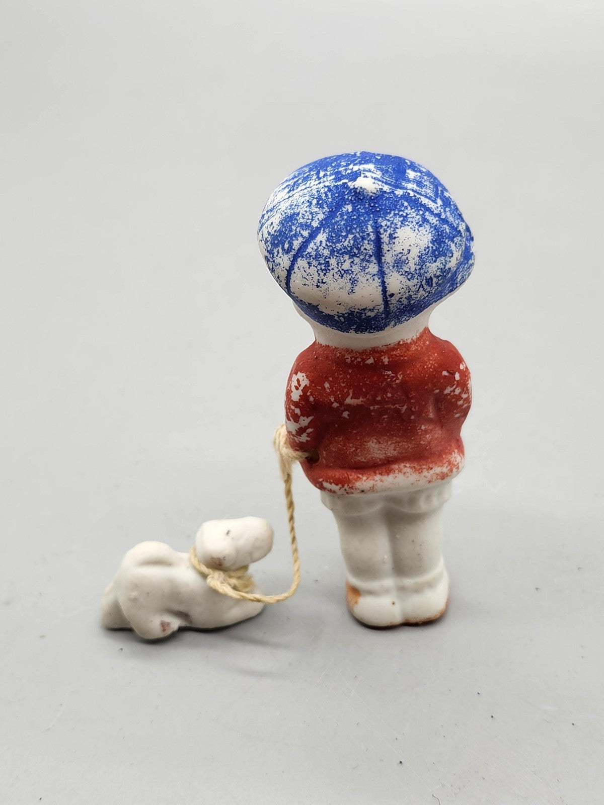 Vintage Child With Dog Porcelain Figurine Small Red Blue Hand Painted Decor