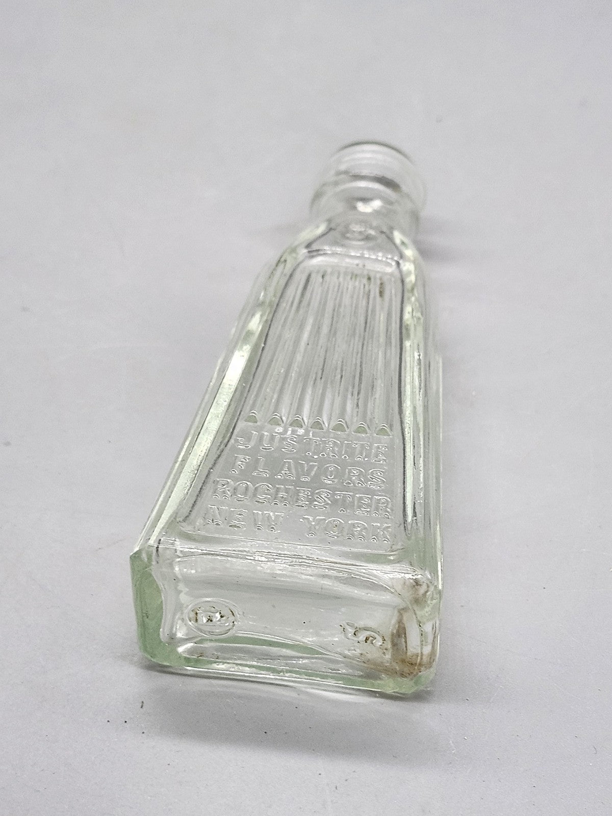 Vintage Justrite Flavors Embossed Clear Glass Bottle Rochester New York Food