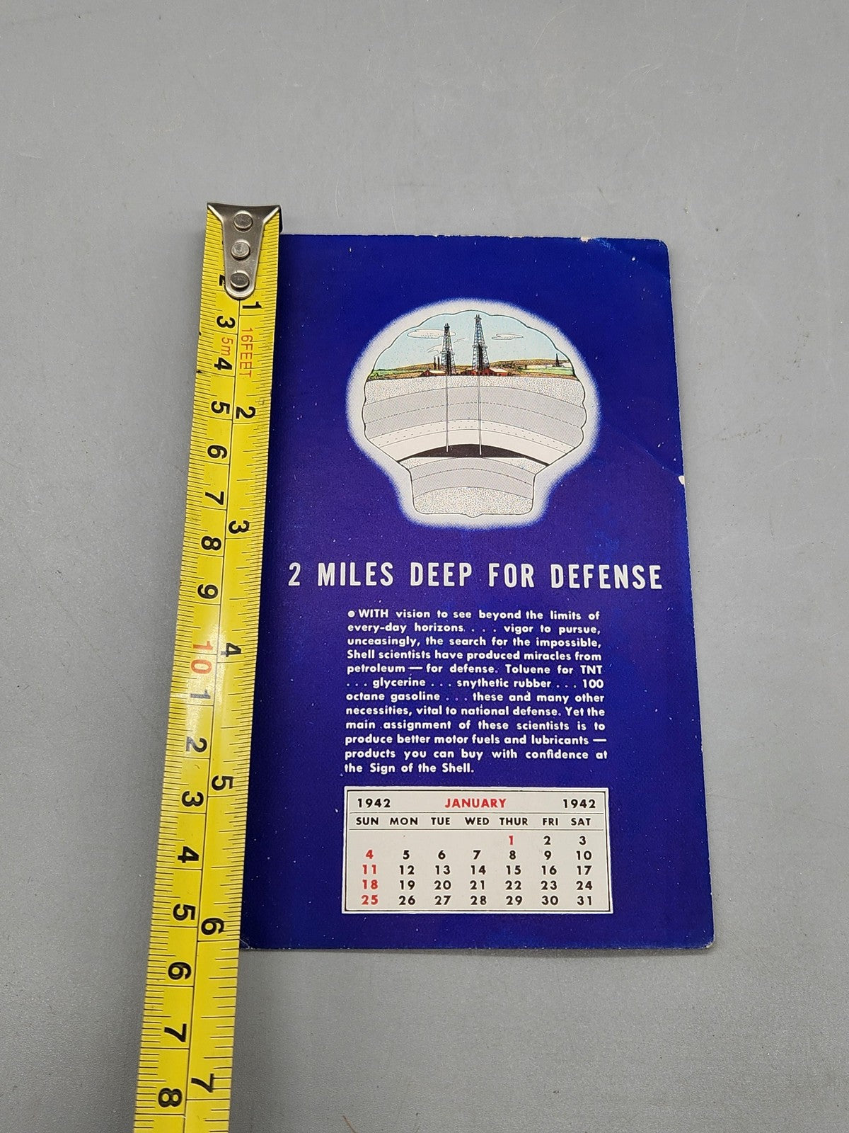 Vintage 1942 Shell 2 Miles Deep For Defense Calendar Ad Sign Gas Oil Blue