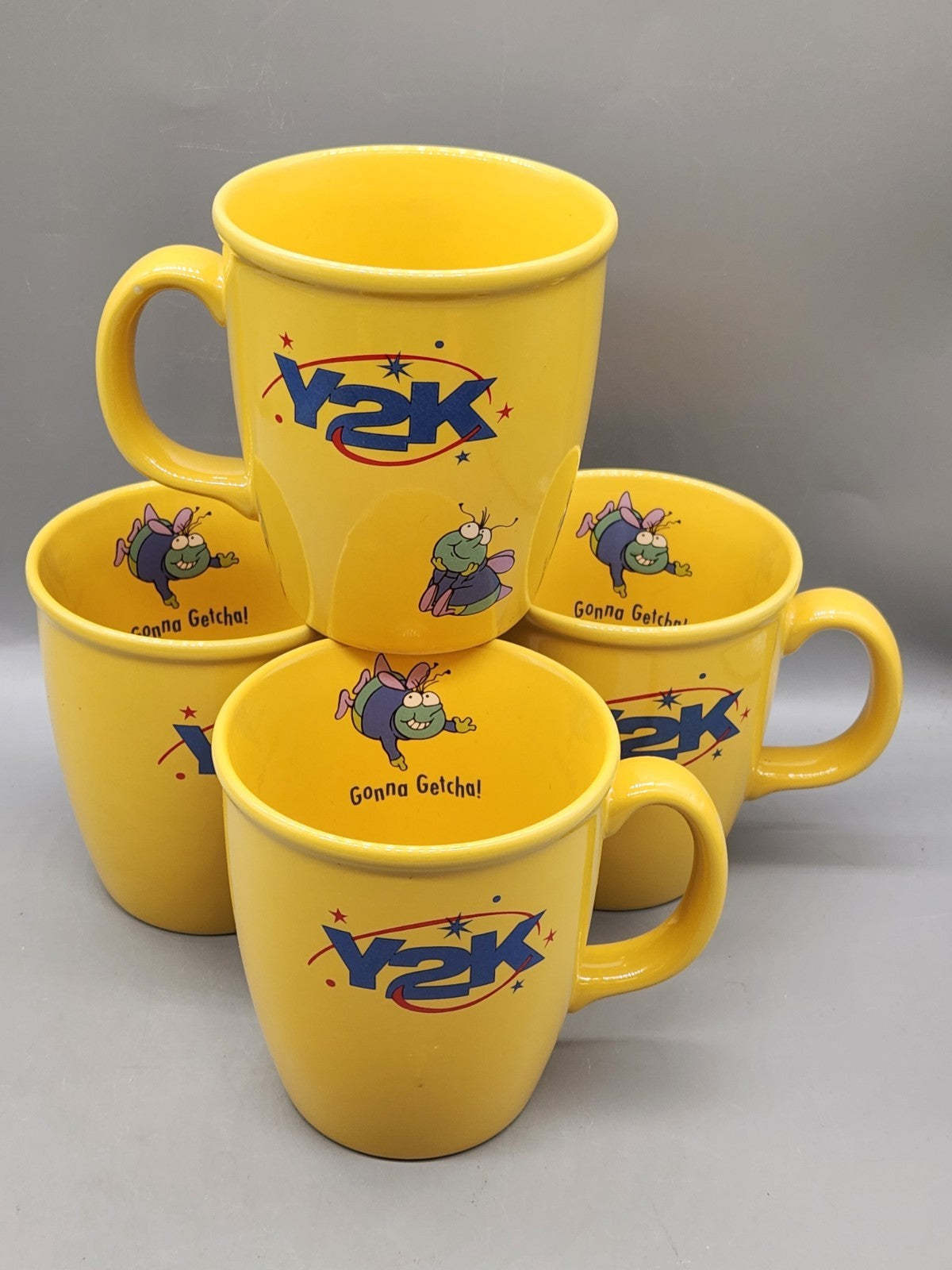 Vintage Y2K Promotional Coffee Mug Set of 4 Yellow Cartoon Fly Gonna Getcha Cups