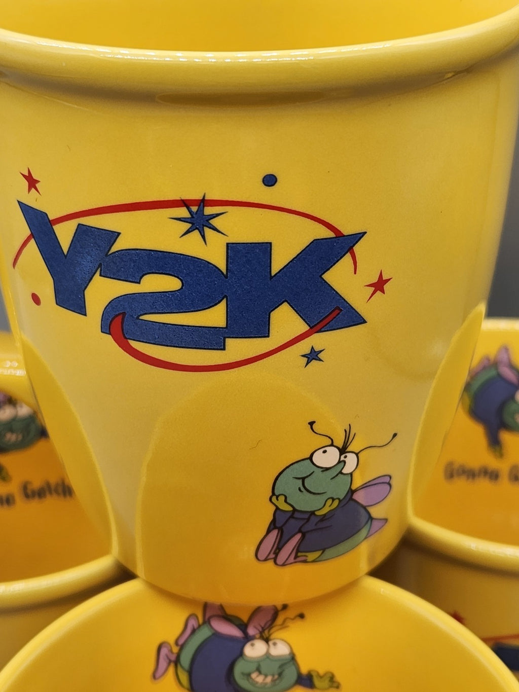 Vintage Y2K Promotional Coffee Mug Set of 4 Yellow Cartoon Fly Gonna Getcha Cups