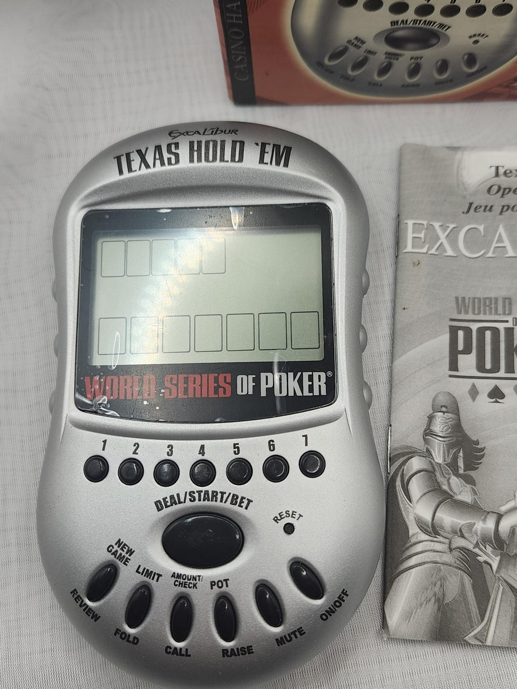 Excalibur Electronics World Series Of Poker Texas Hold 'Em Handheld Game Silver