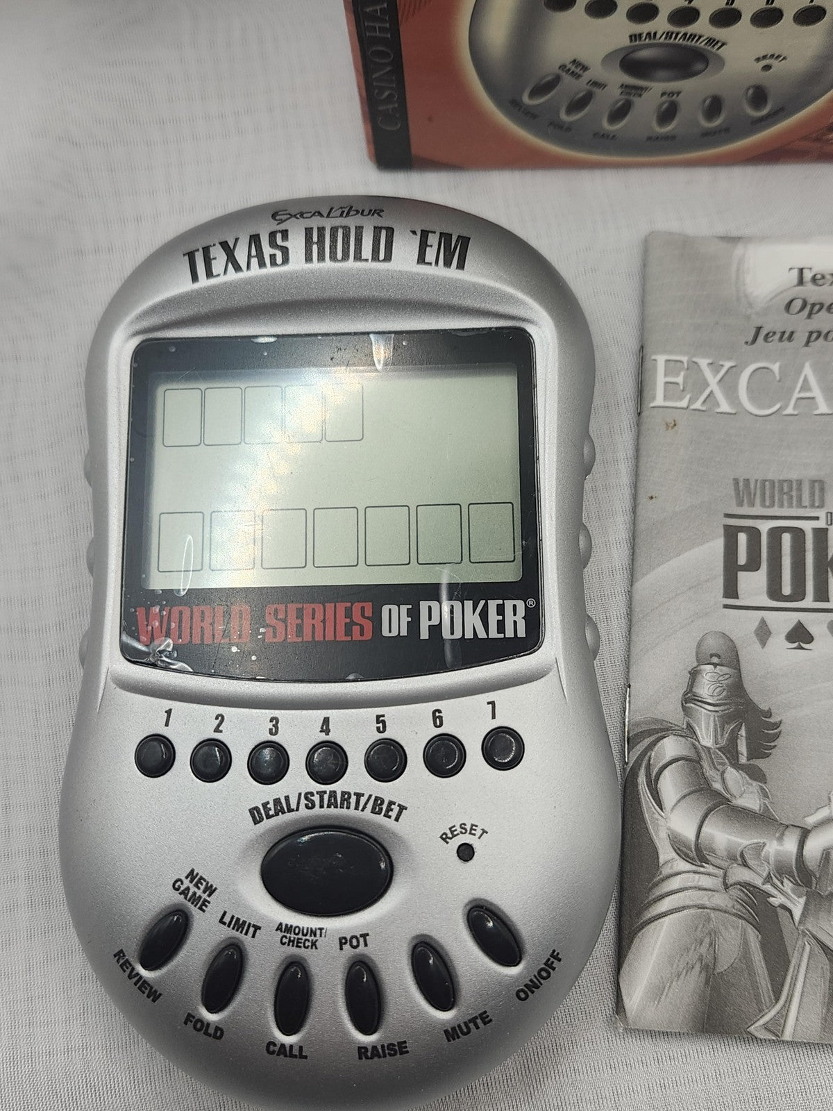 Excalibur Electronics World Series Of Poker Texas Hold 'Em Handheld Game Silver