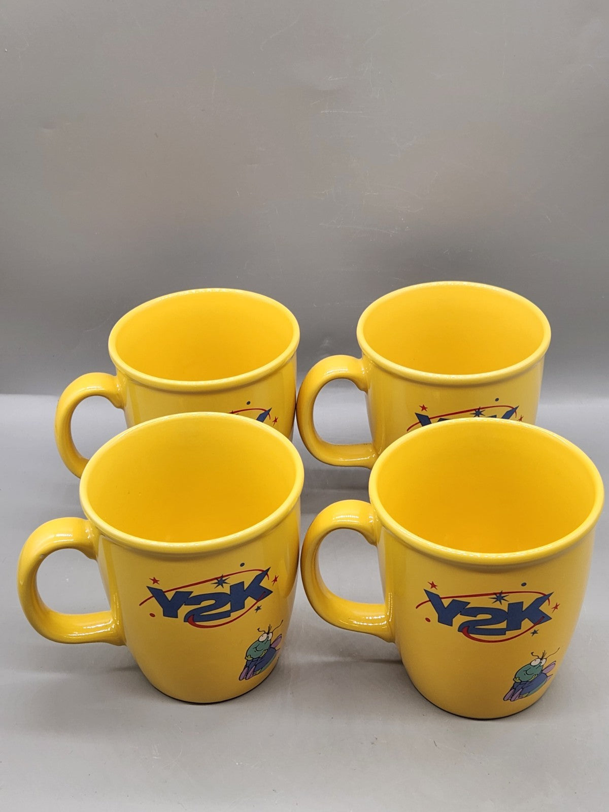 Vintage Y2K Promotional Coffee Mug Set of 4 Yellow Cartoon Fly Gonna Getcha Cups