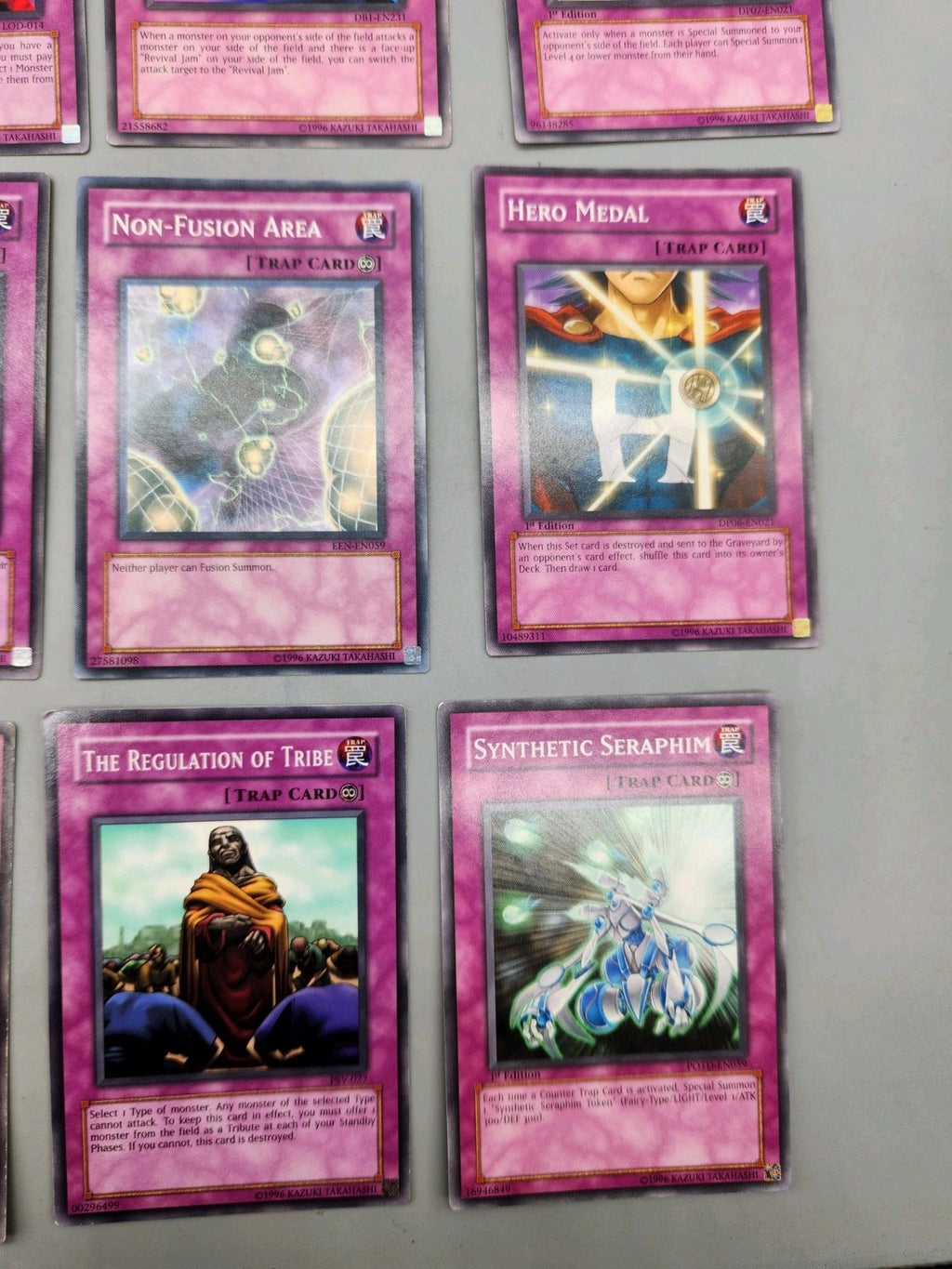 Up for sale is a lot of 9 authentic Yu-Gi-Oh! Trap...