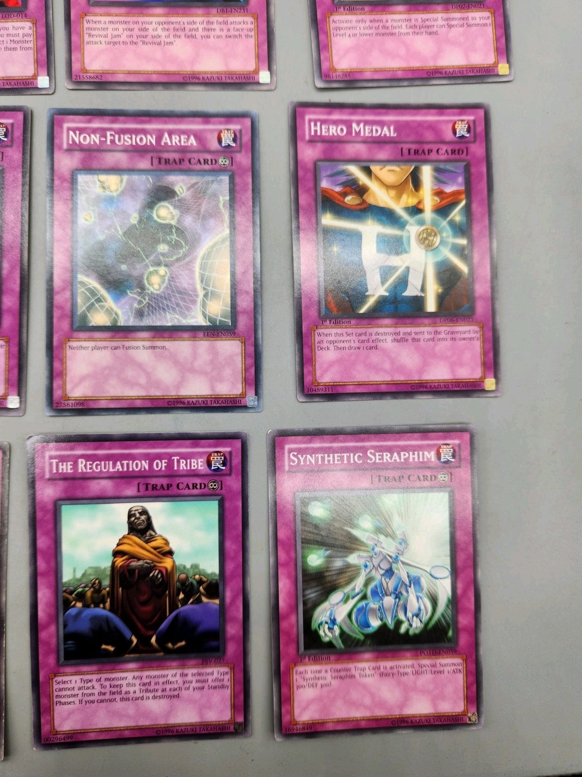 Up for sale is a lot of 9 authentic Yu-Gi-Oh! Trap...
