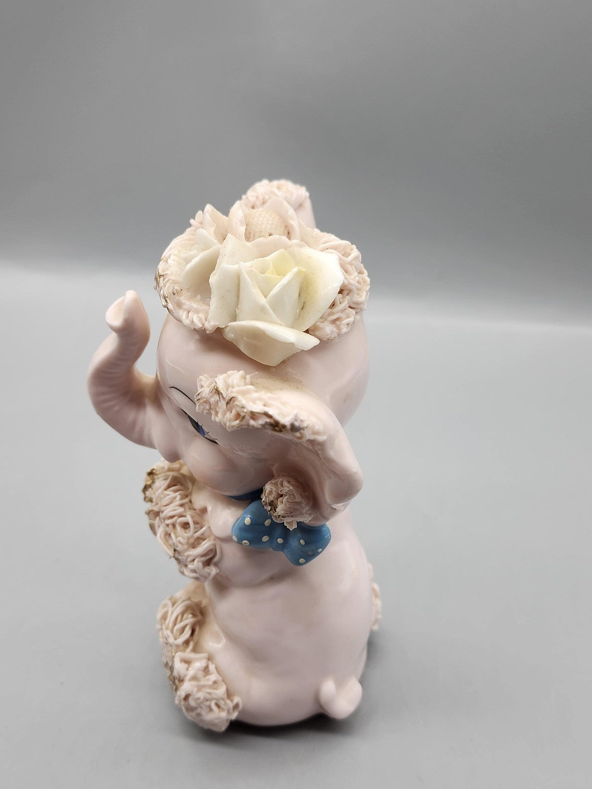 Vintage Pink Porcelain Elephant Figurine Spaghetti Flowers Blue Bow Collectible