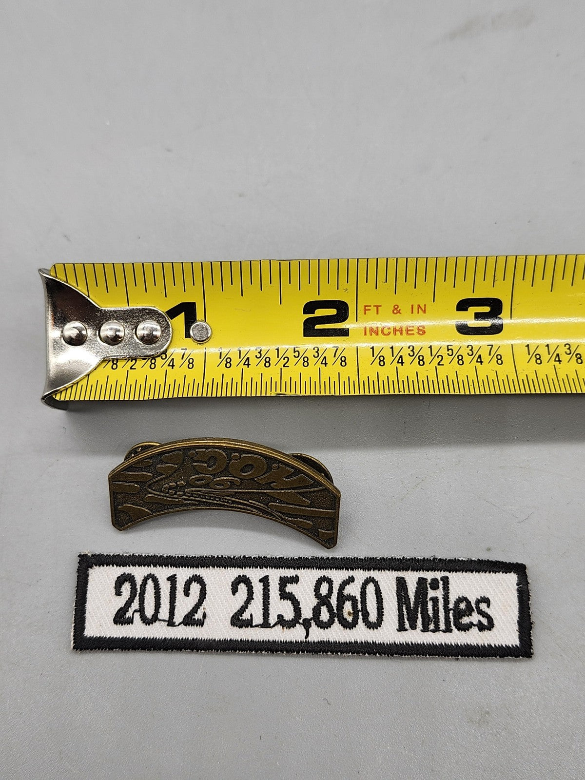 Harley-Davidson HOG Mileage Lapel Pin Patch 2012 215,860 Miles Bronze White