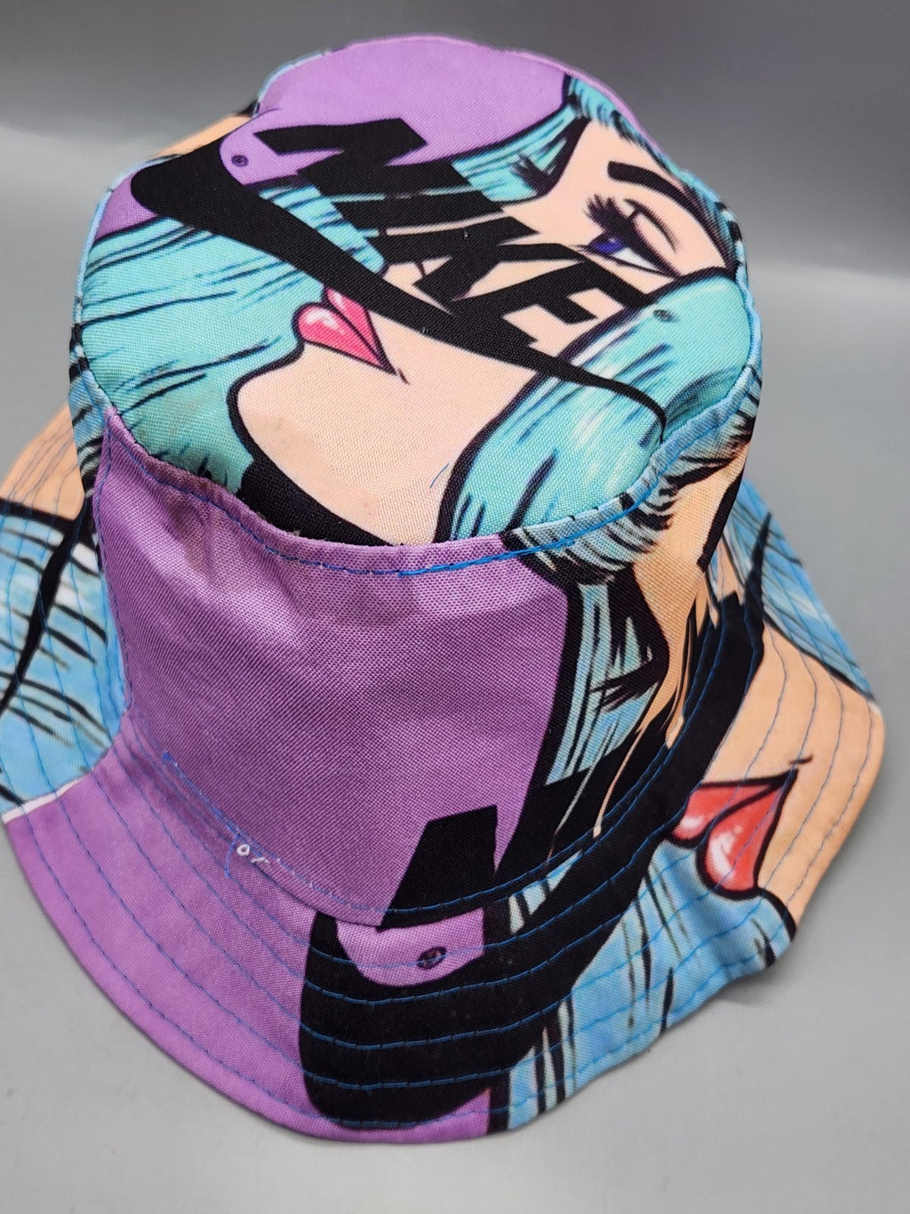 Nike Anime Art Bucket Hat – Purple/Blue Graphic Print Hat