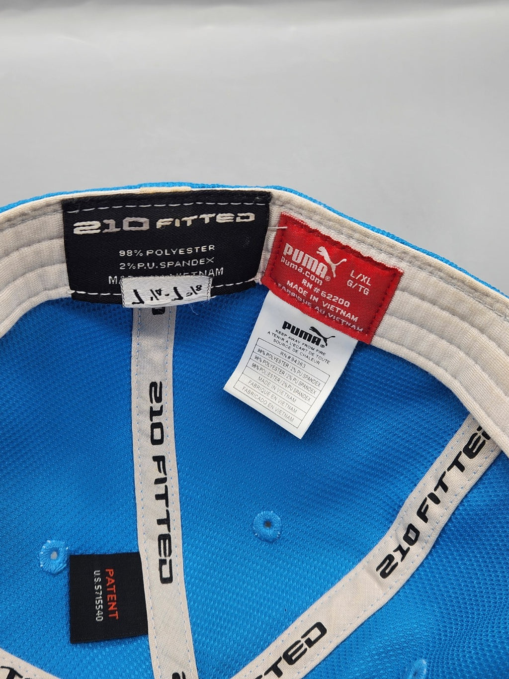 Puma 210 Fitted Blue Performance Golf Hat Cap L/XL White Trim FlexFit