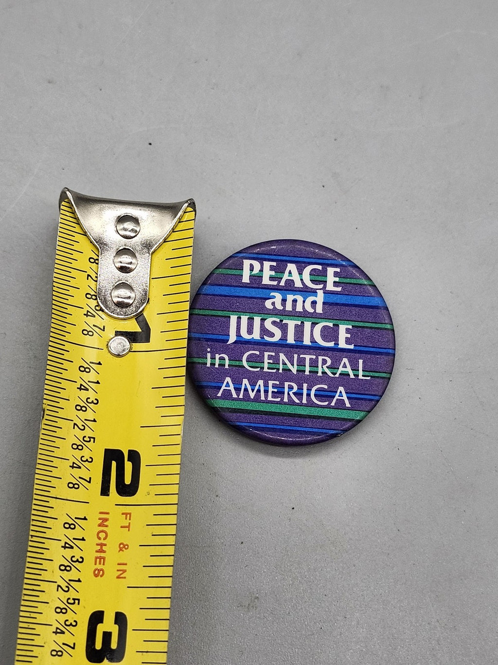 Vintage Peace And Justice Central America Pinback Button Purple Slogan Activism