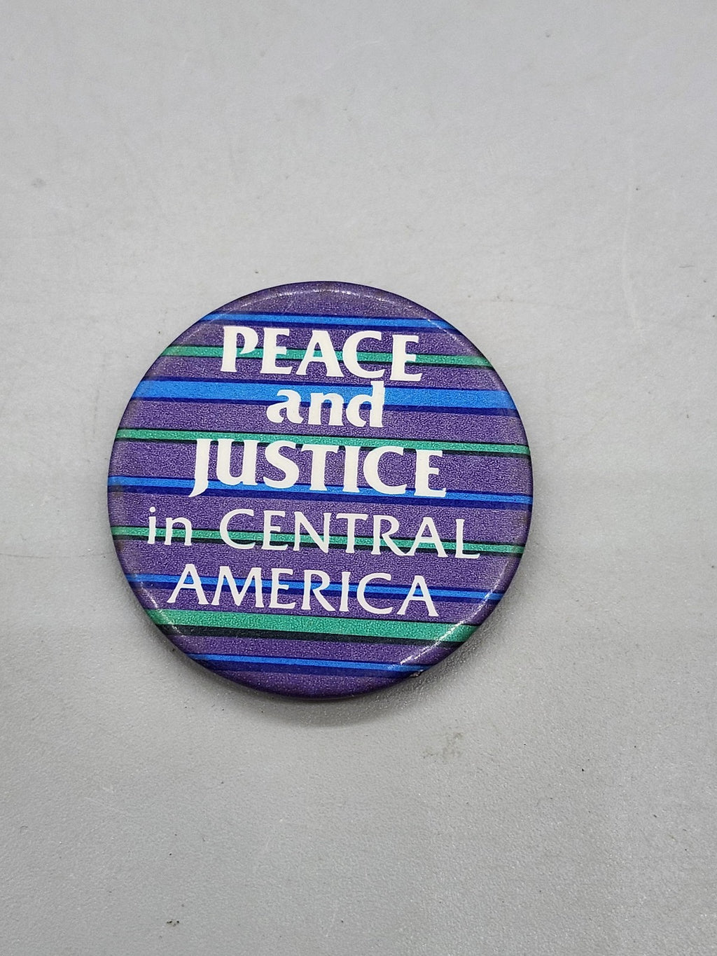 Vintage Peace And Justice Central America Pinback Button Purple Slogan Activism