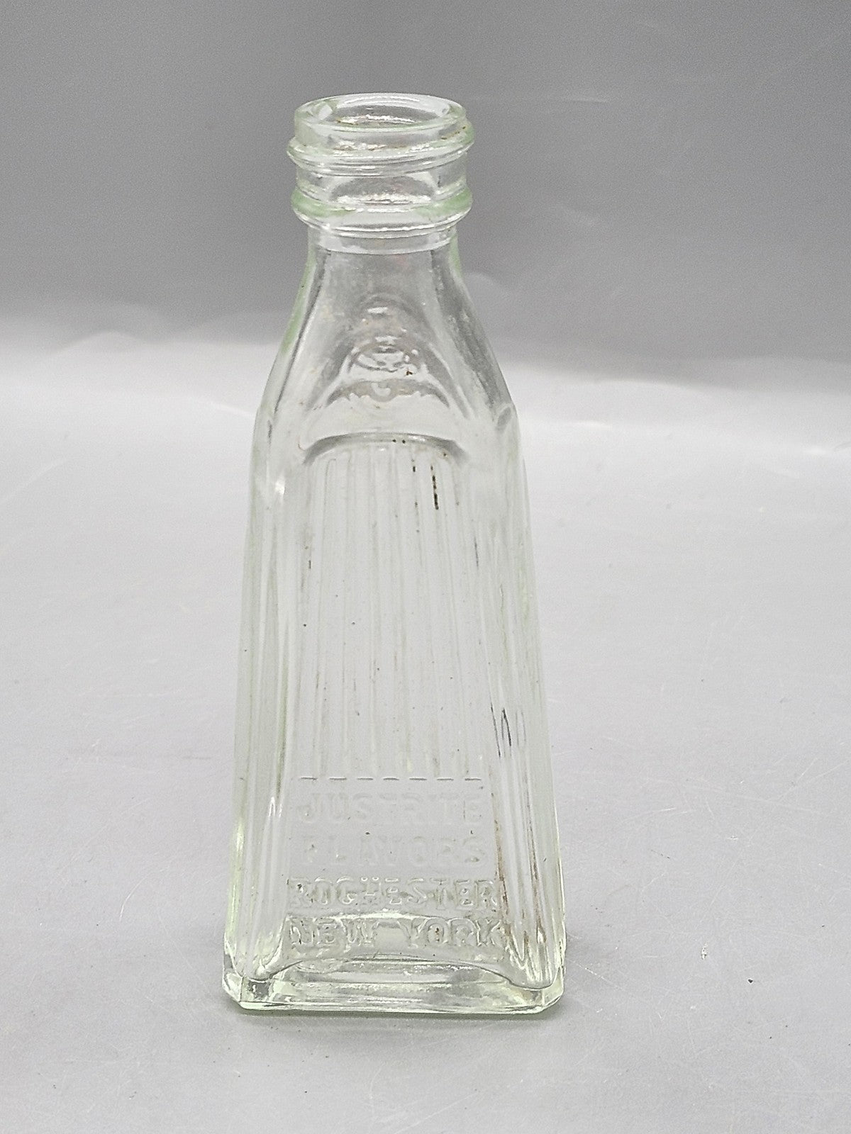 Vintage Justrite Flavors Embossed Clear Glass Bottle Rochester New York Food