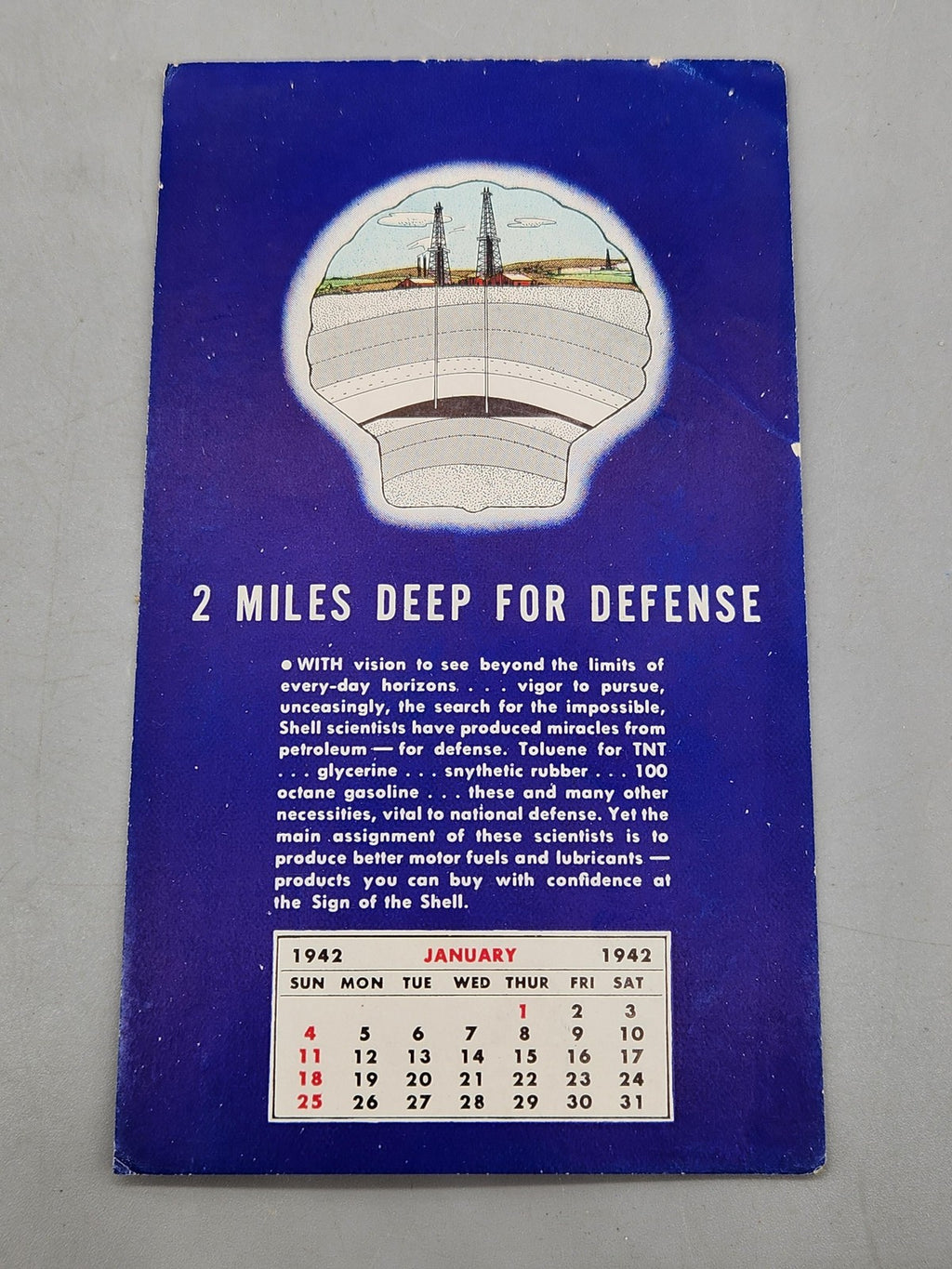Vintage 1942 Shell 2 Miles Deep For Defense Calendar Ad Sign Gas Oil Blue