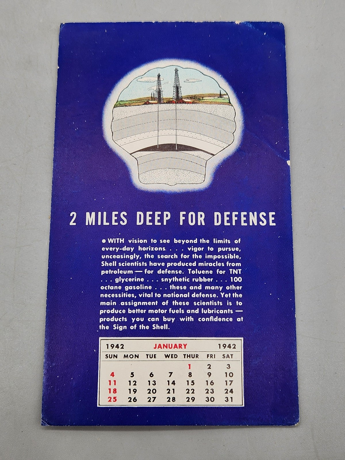 Vintage 1942 Shell 2 Miles Deep For Defense Calendar Ad Sign Gas Oil Blue