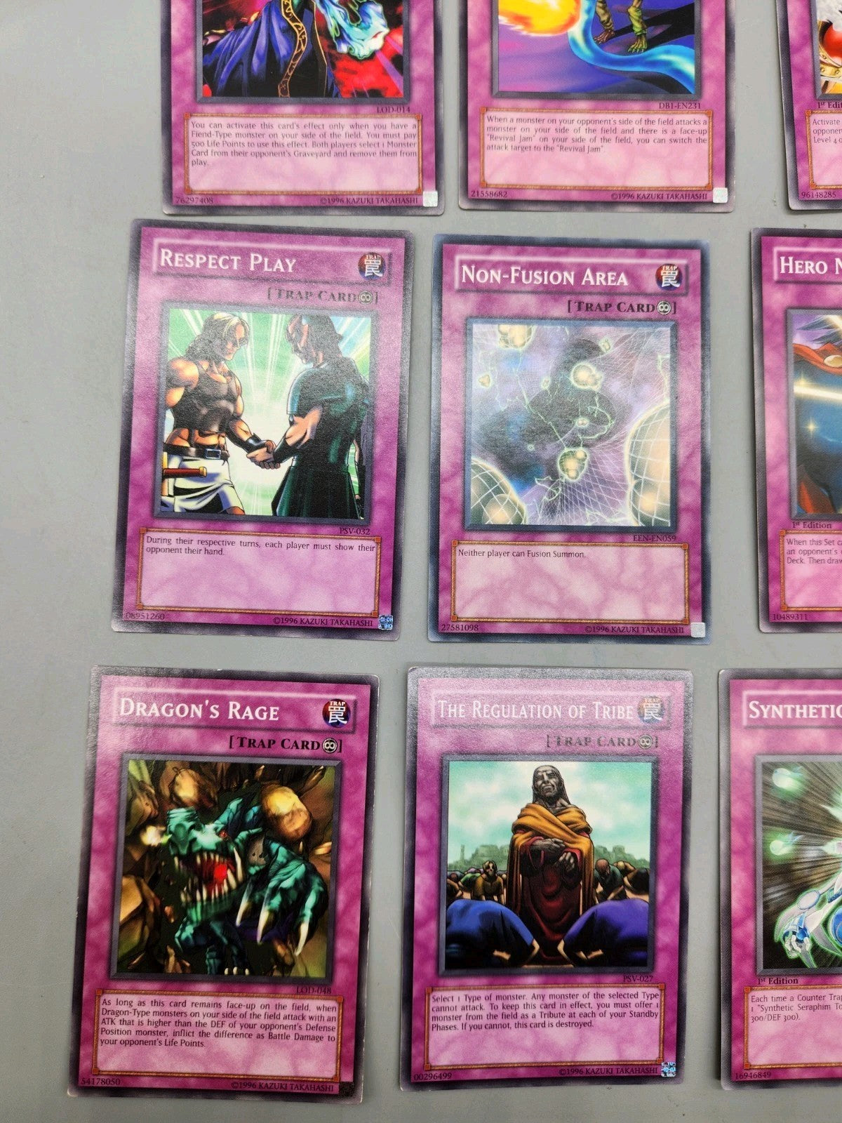 Up for sale is a lot of 9 authentic Yu-Gi-Oh! Trap...