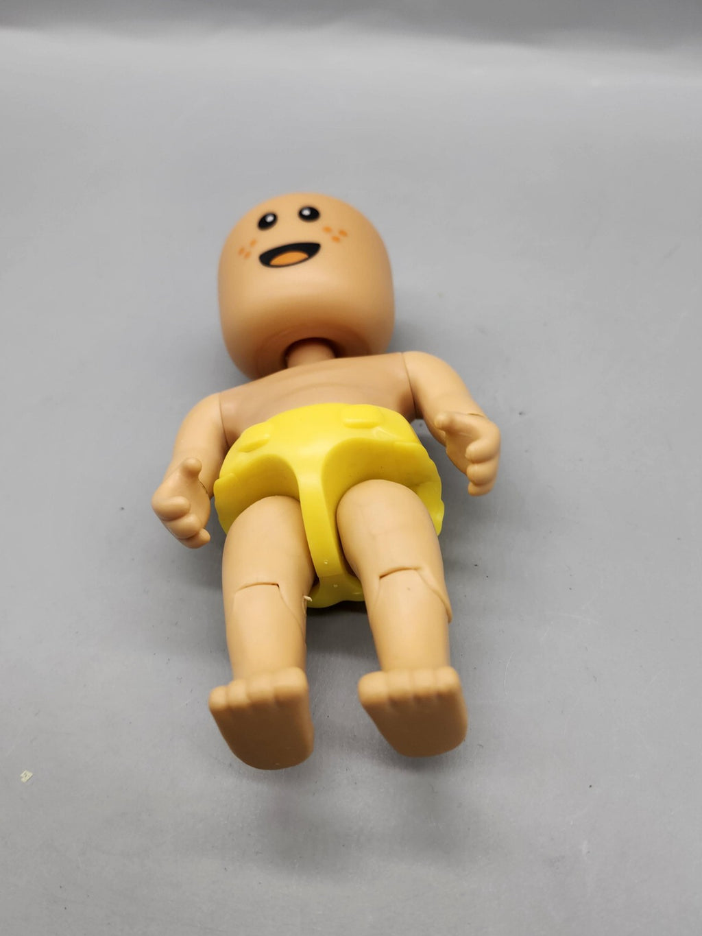 WowWee Baby Action Figure Yellow Diaper Big Head Beige Plastic Toy Loose 2021