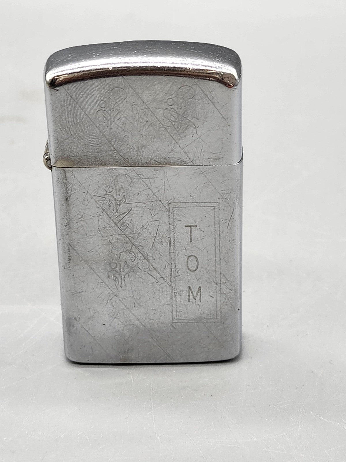 Vintage Zippo Slim Lighter Engraved TOM Silver Tone Metal Tobacco Decor