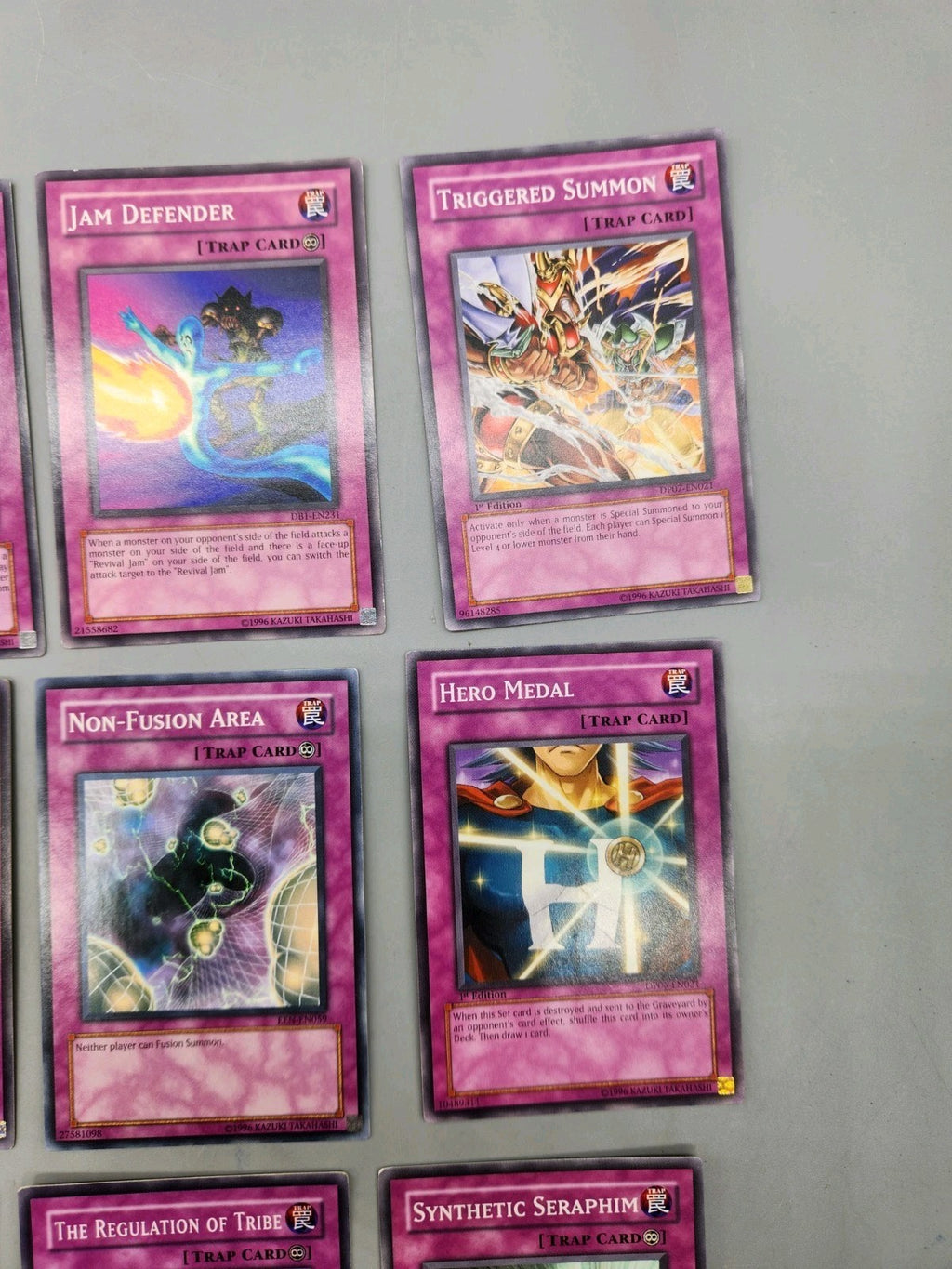 Up for sale is a lot of 9 authentic Yu-Gi-Oh! Trap...