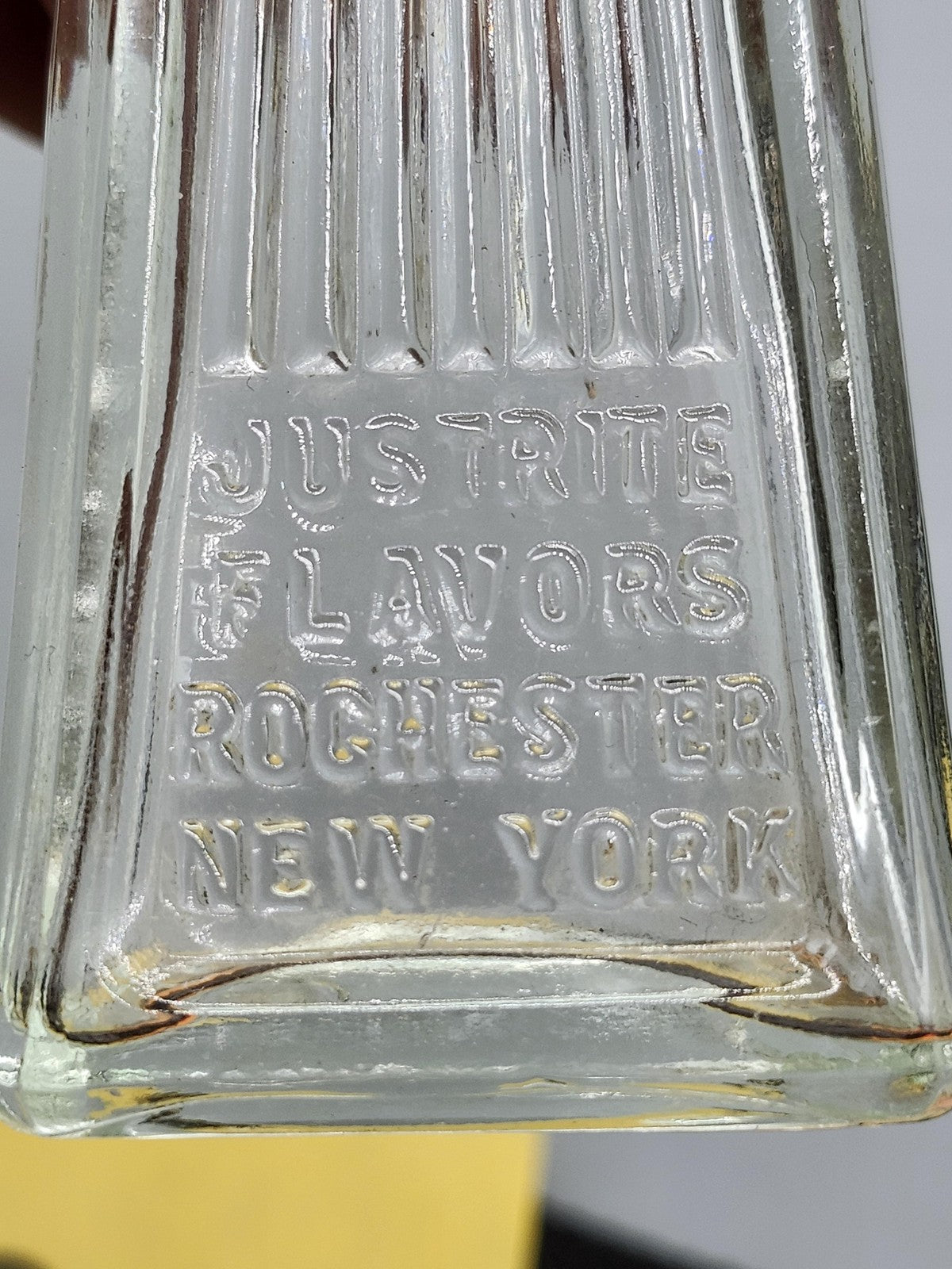 Vintage Justrite Flavors Embossed Clear Glass Bottle Rochester New York Food