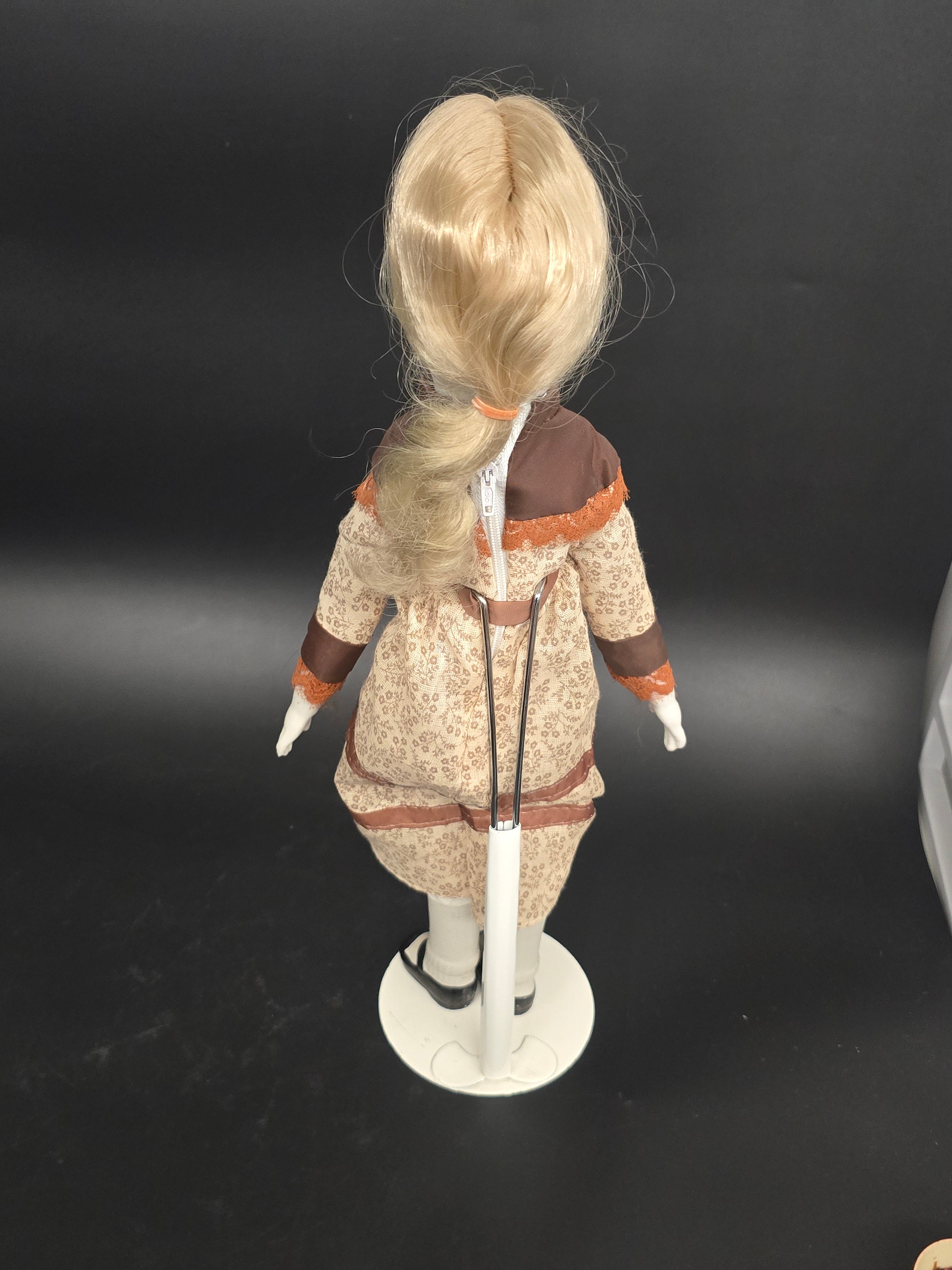 Vintage Porcelain Doll – Blonde Hair – Cloth Body – Brown Prairie Dress – Approx. 18"